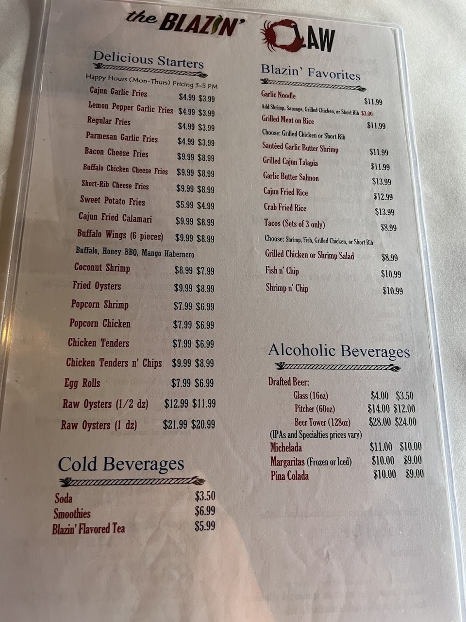 Printed menu with seafood boils and fried chicken.